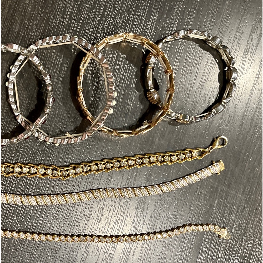 Bracelet Bundle of 6. 4 Stretchy and 2 Tennis Bracelets.